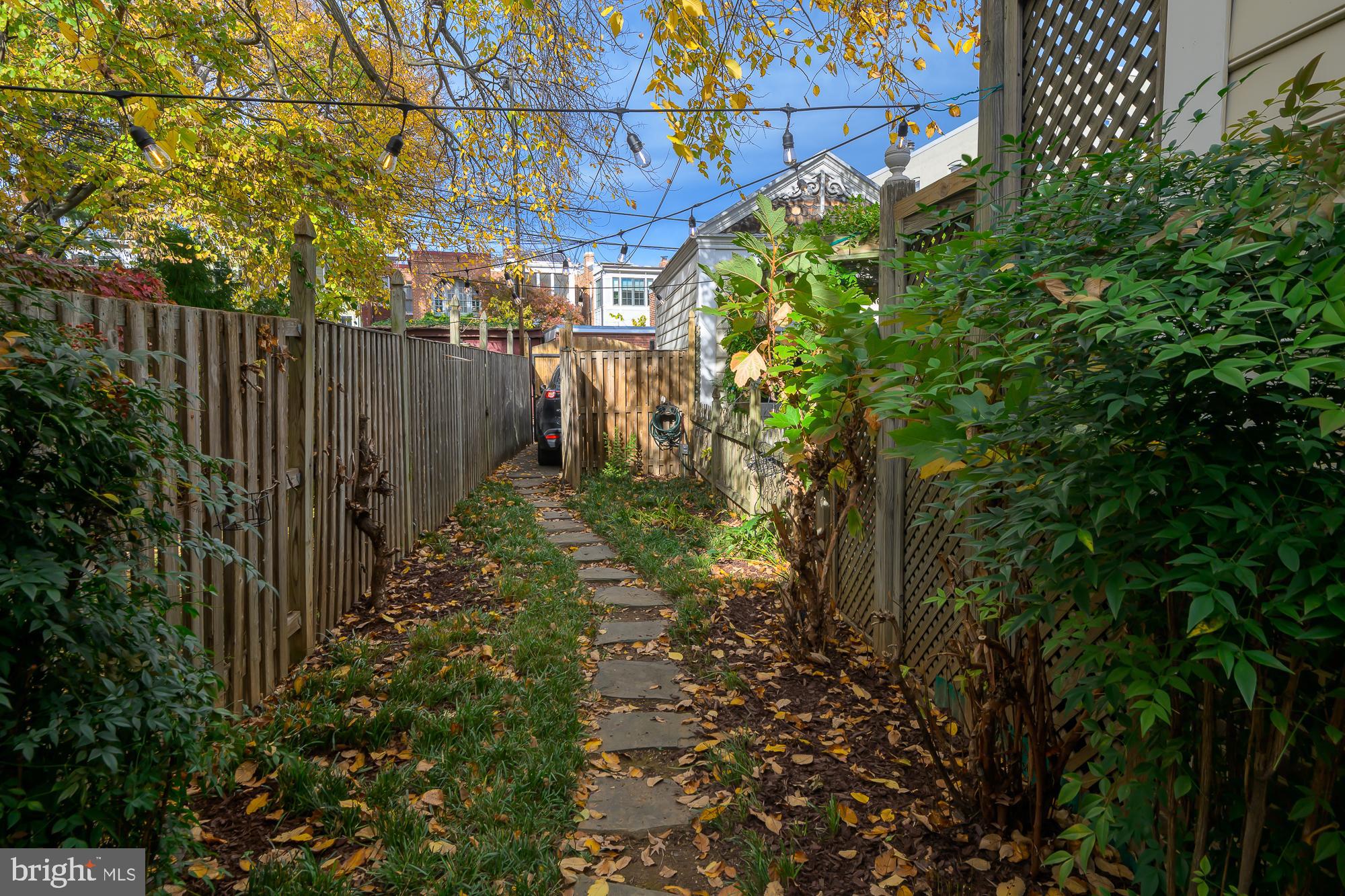 1330 Massachusetts Avenue Southeast Washington, DC 20003 - Photo 12 of 34 a backyard of a house with lots of green space