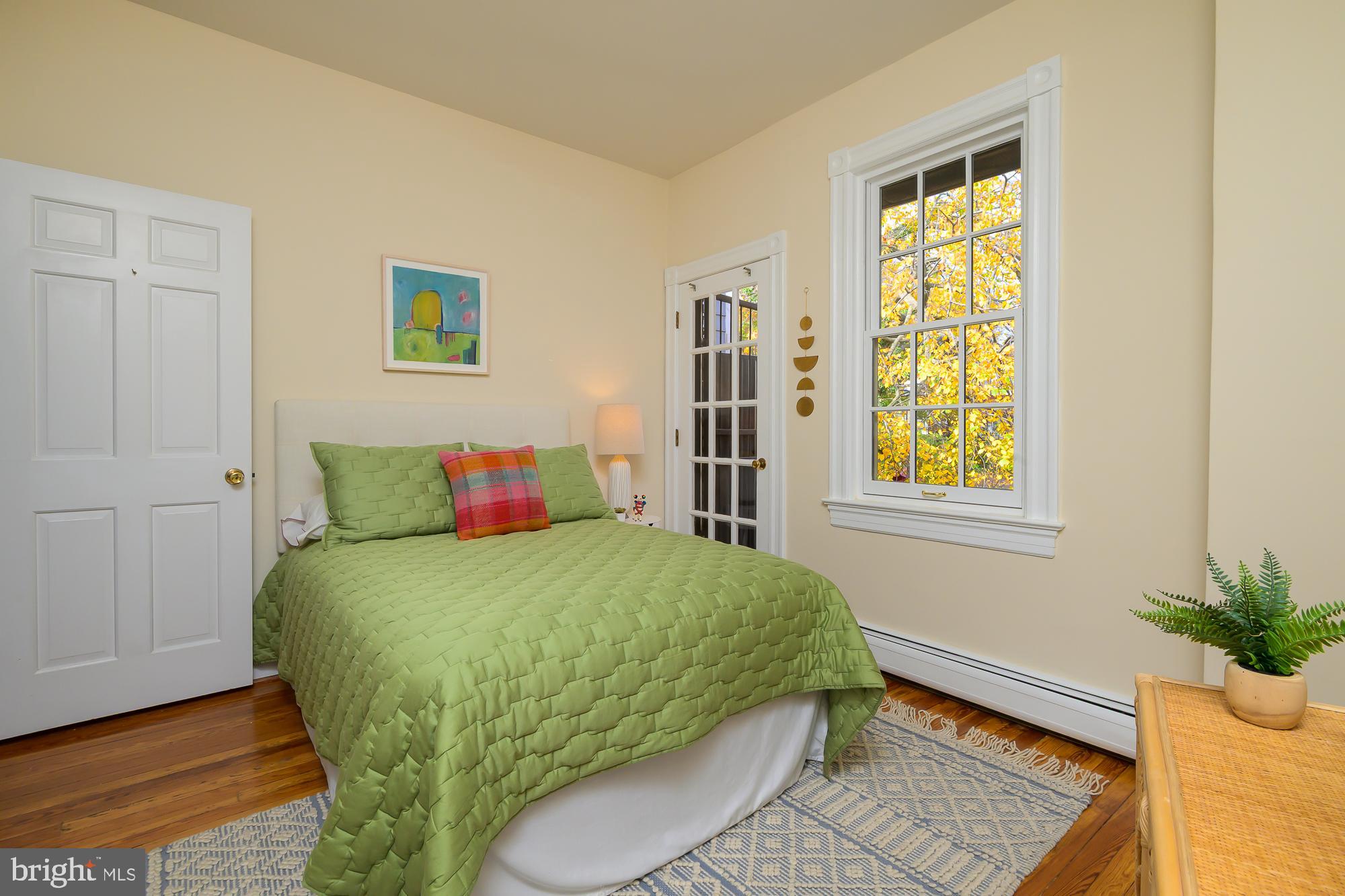 1330 Massachusetts Avenue Southeast Washington, DC 20003 - Photo 20 of 34 a bedroom with a bed and a window