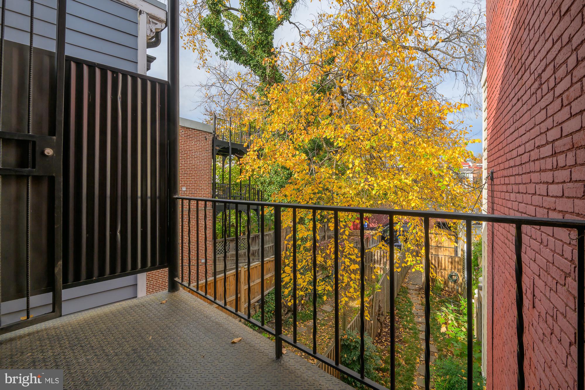 1330 Massachusetts Avenue Southeast Washington, DC 20003 - Photo 22 of 34 a view of a balcony with wooden fence