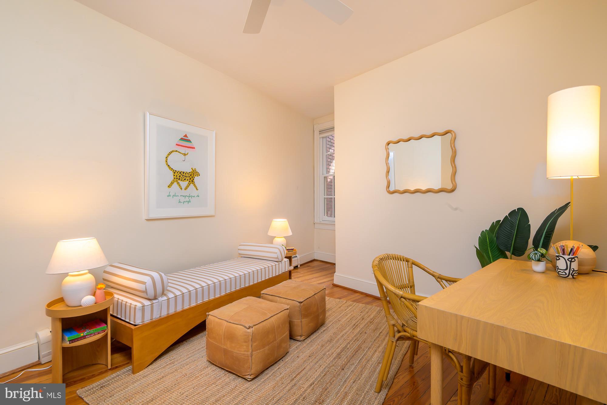 1330 Massachusetts Avenue Southeast Washington, DC 20003 - Photo 23 of 34 a bedroom with a bed and lamp