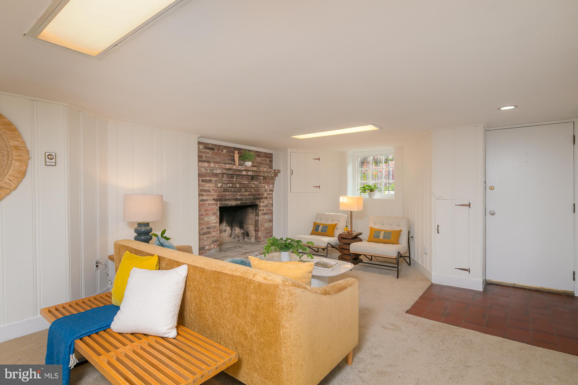 1330 Massachusetts Avenue Southeast Washington, DC 20003 - Photo 26 of 34 a living room with furniture and a fireplace