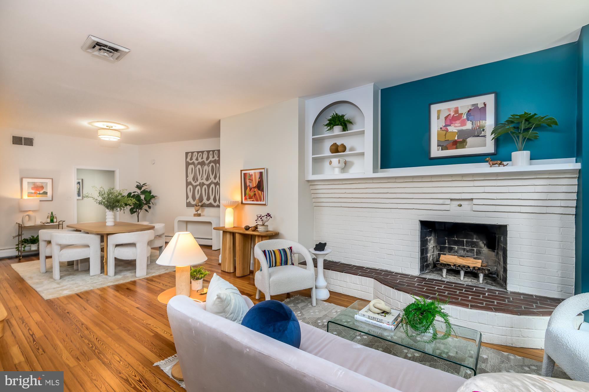 1330 Massachusetts Avenue Southeast Washington, DC 20003 - Photo 3 of 34 a living room with furniture and a fireplace