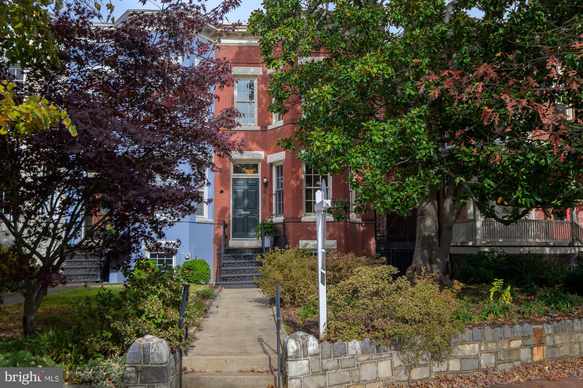 1330 Massachusetts Avenue Southeast Washington, DC 20003 - Photo 34 of 34 a front view of a house with a yard and tree