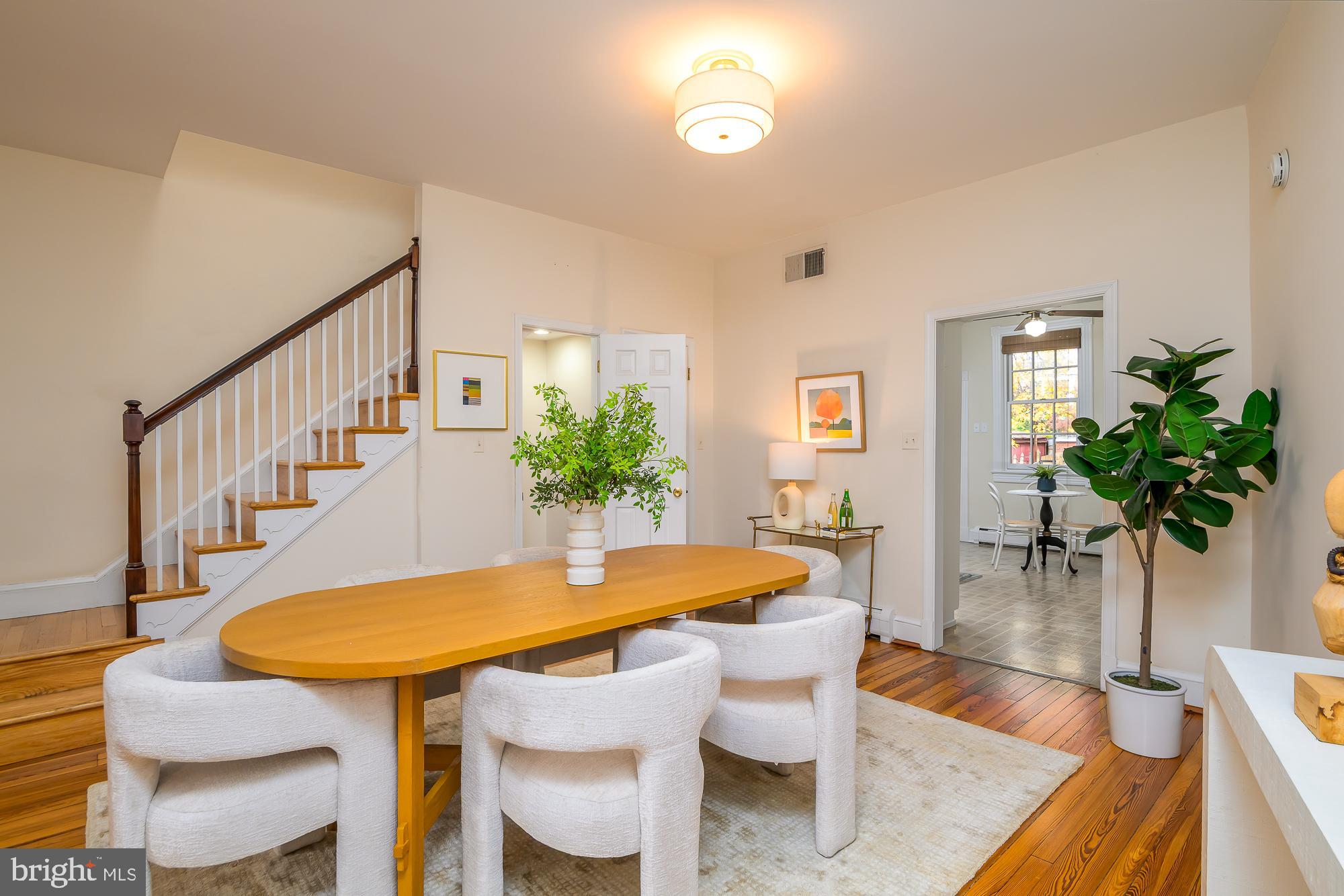 1330 Massachusetts Avenue Southeast Washington, DC 20003 - Photo 8 of 34 a dining room with furniture and wooden floor