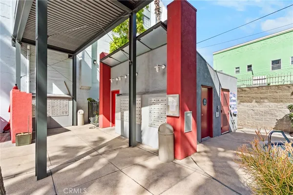 a view of a pathway along with wooden fence