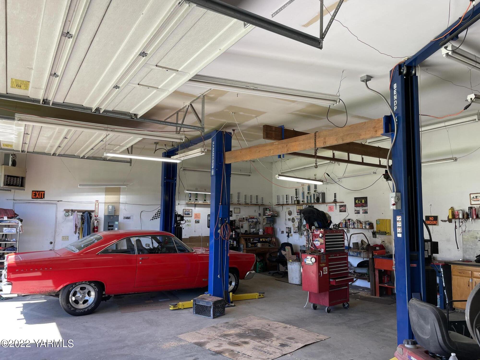 912 Beckner Road Sunnyside, WA 98944 - Photo 5 of 17 a car is parked in garage