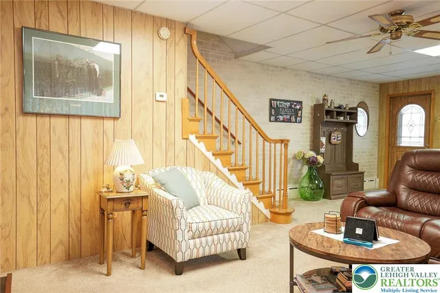 a kitchen with stainless steel appliances a refrigerator sink and cabinets