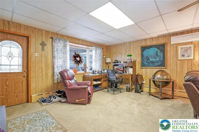 a view of an empty room with stairs