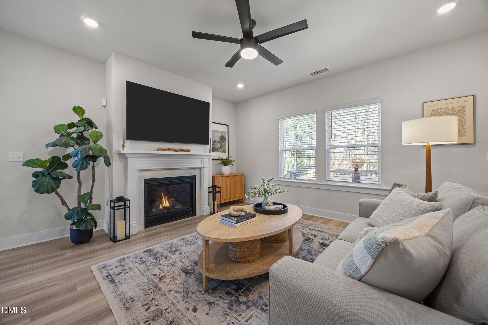 403 Sustainable Way Raleigh, NC 27610 - Photo 2 of 39 Family Room with Cozy Fireplace