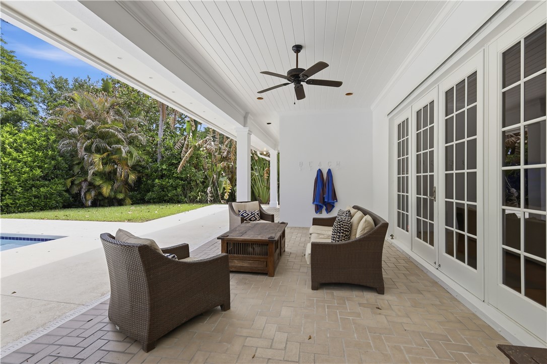 2116 Cavalla Road Vero Beach, FL 32963 - Photo 17 of 23 a living room with patio furniture and a potted plant
