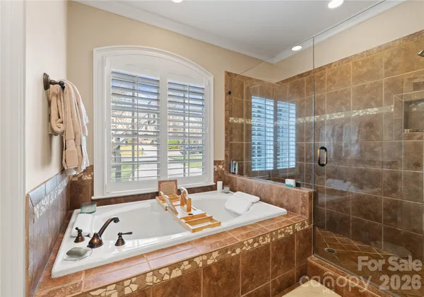 a bath tub sitting next to a window
