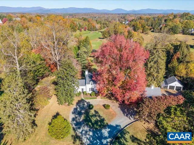 a view of a city with mountains in the background