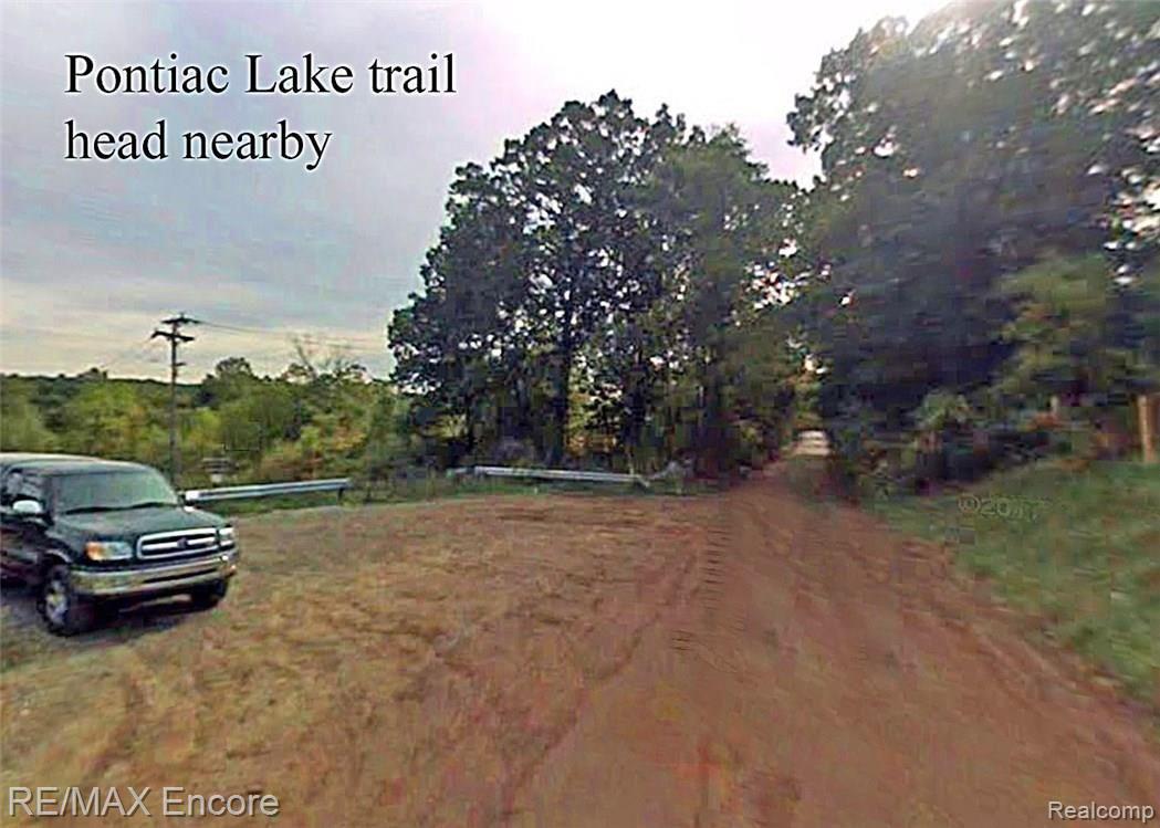 0 Hitchcock Parcel A Road White Lake, MI 48383 - Photo 3 of 4 Park trail head.jpg
