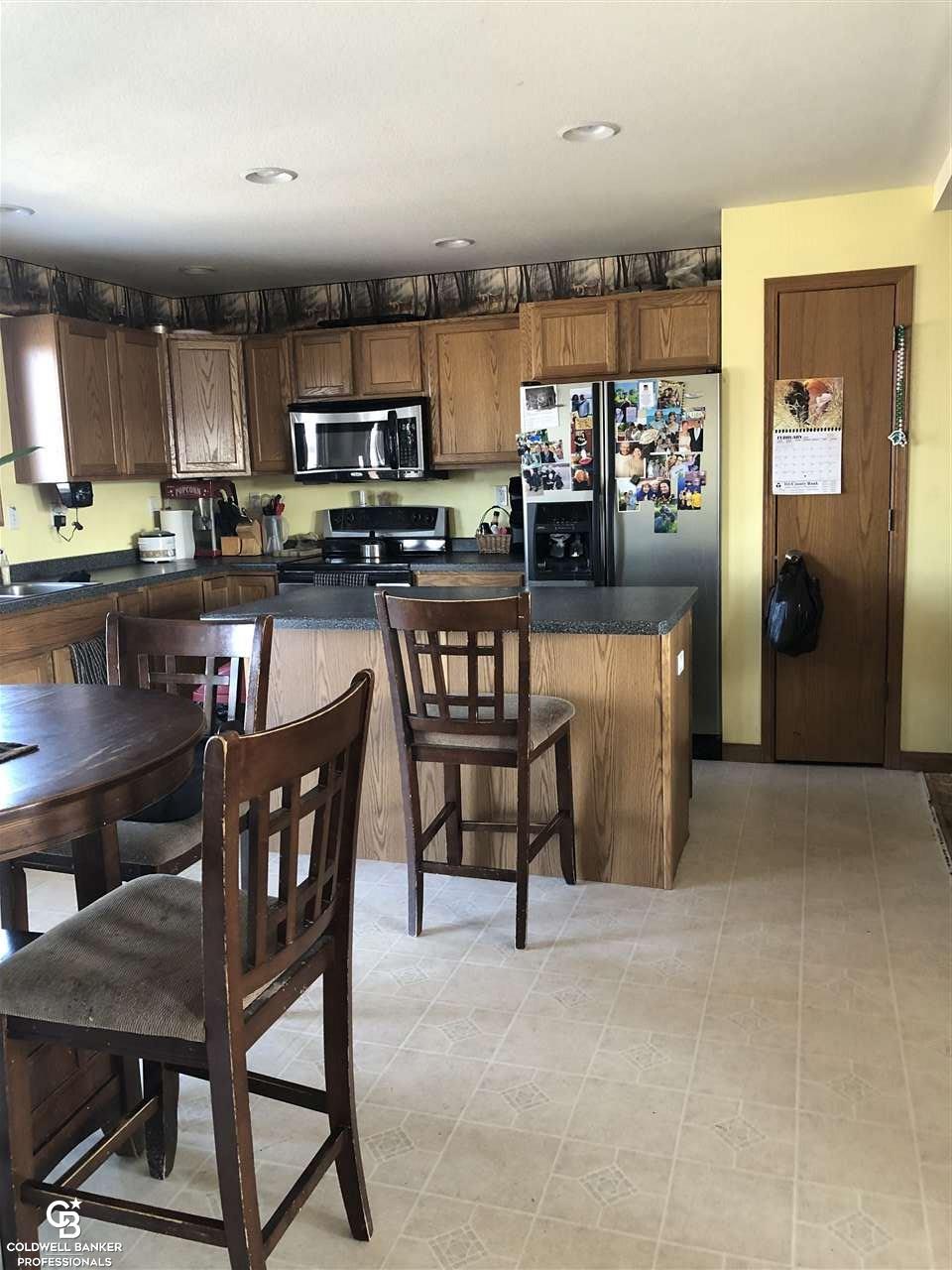 1103 East Galbraith Line Road Melvin, MI 48454 - Photo 4 of 43 Kitchen & dining room view