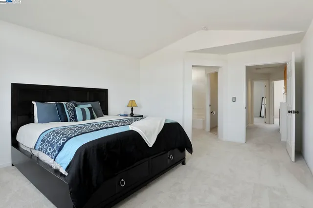 a bedroom with a bed and closet