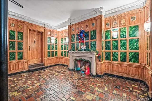 a view of an entryway with a fireplace