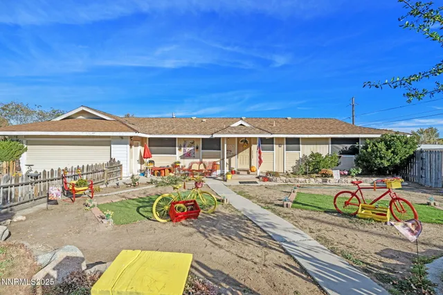 swimming pool view with a seating space