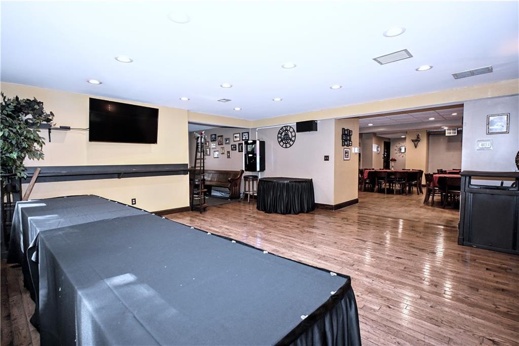 807 Dry Run Road Monongahela, PA 15063 - Photo 13 of 50 Another View of Gorgeous Hardwood Floors in Food Service area opening Nicely into Dining Room and to the left is a 14x5 Side Entrance leading to Patio
