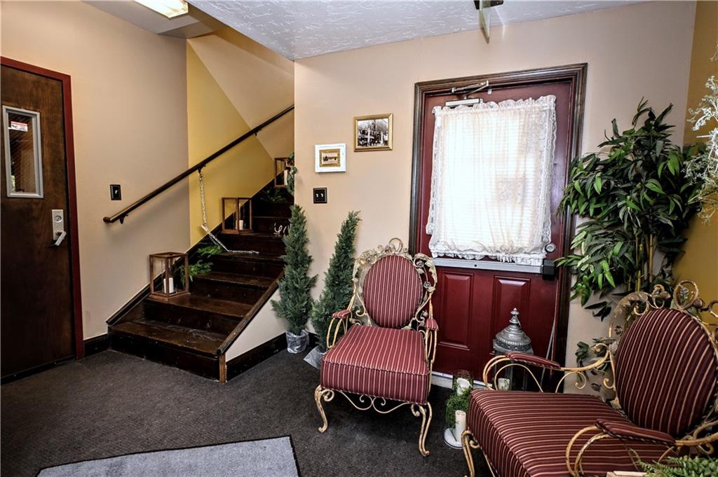 807 Dry Run Road Monongahela, PA 15063 - Photo 17 of 50 Elegant 12x10 Entry and Wood Steps leading to Incredible 2nd Floor which could be an apartment, 2nd Bar area, dressing area, additional display room for retail or office space