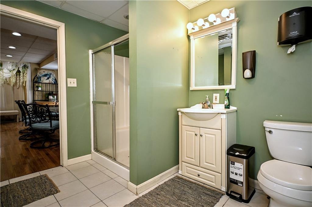 807 Dry Run Road Monongahela, PA 15063 - Photo 23 of 50 a bathroom with a toilet sink and mirror