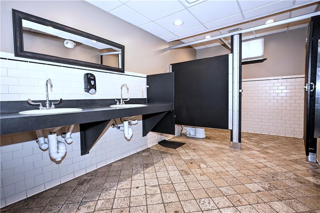 807 Dry Run Road Monongahela, PA 15063 - Photo 31 of 50 Both Updated Bathroom offer double sink vanity and this one does have a urinal