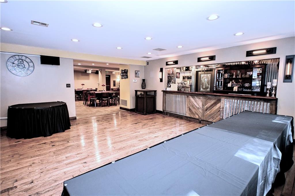 807 Dry Run Road Monongahela, PA 15063 - Photo 32 of 50 Gleaming Original Hardwood Floors in Food Service area next to Bar & Recessed Lighting allowing the prefect ambiance