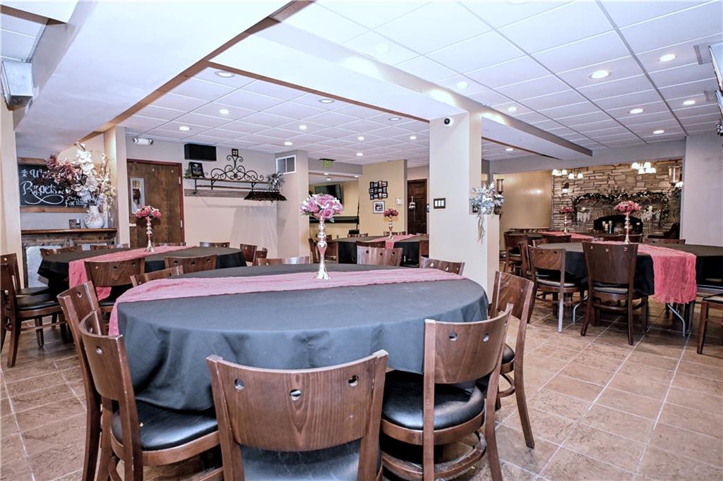 807 Dry Run Road Monongahela, PA 15063 - Photo 36 of 50 a dining table with chairs and a view of kitchen
