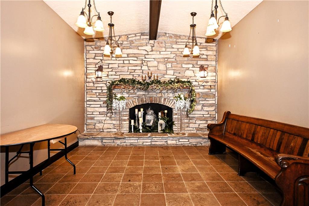 807 Dry Run Road Monongahela, PA 15063 - Photo 4 of 50 Stone Wood Burning Fireplace & Attractive Light Fixtures adds Elegance to this 16x12 Room