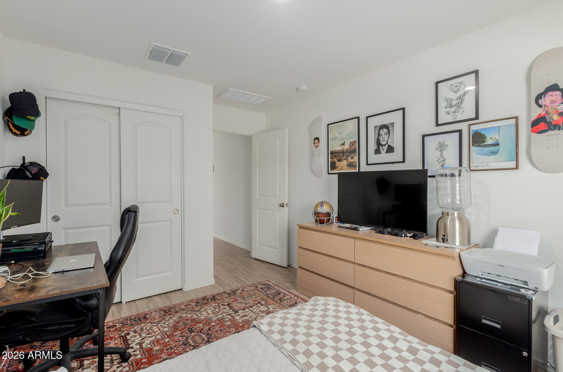 4702 South Riata Street Gilbert, AZ 85297 - Photo 19 of 31 a living room with furniture and a flat screen tv