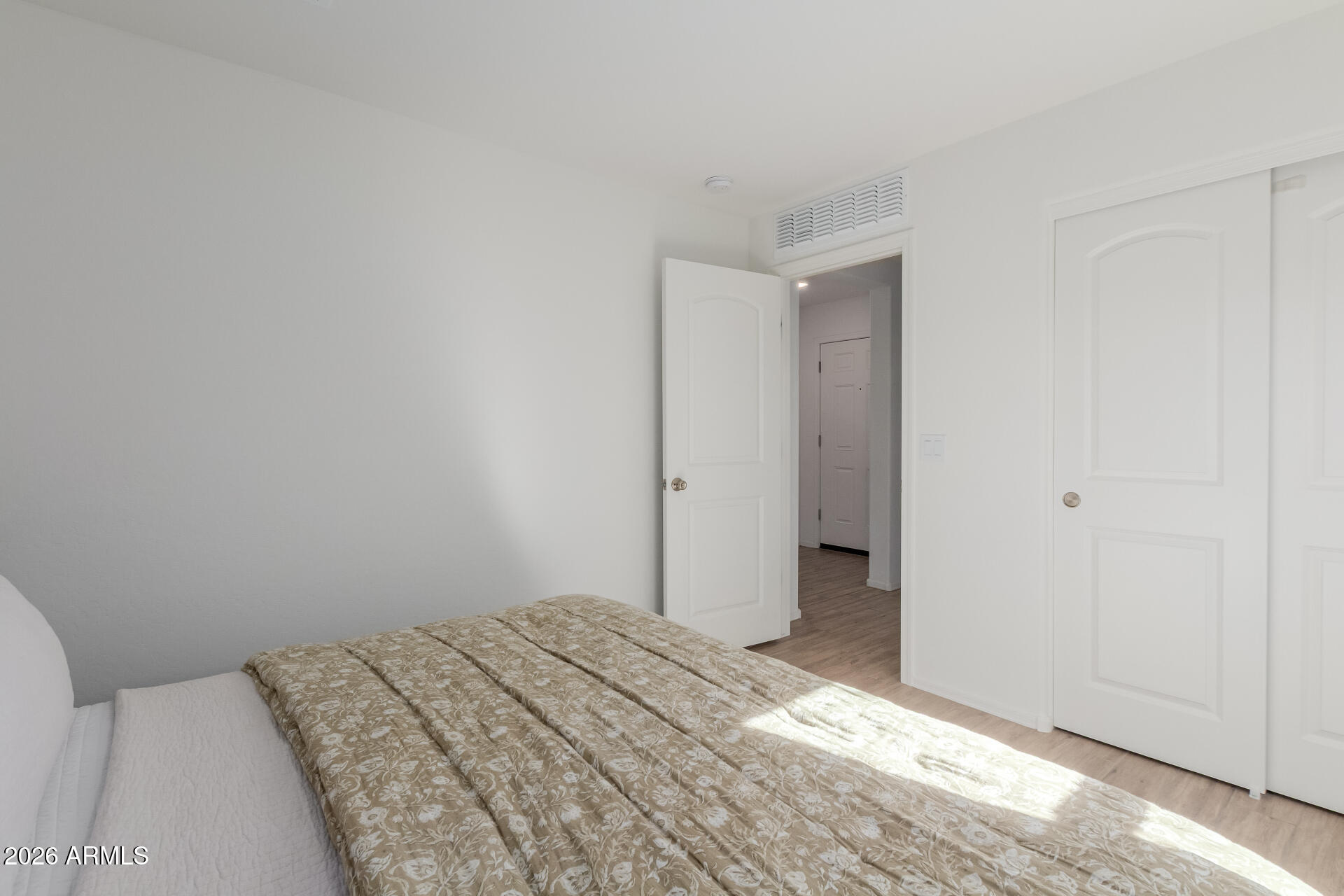 4702 South Riata Street Gilbert, AZ 85297 - Photo 21 of 31 a bedroom with a bed and a bathroom