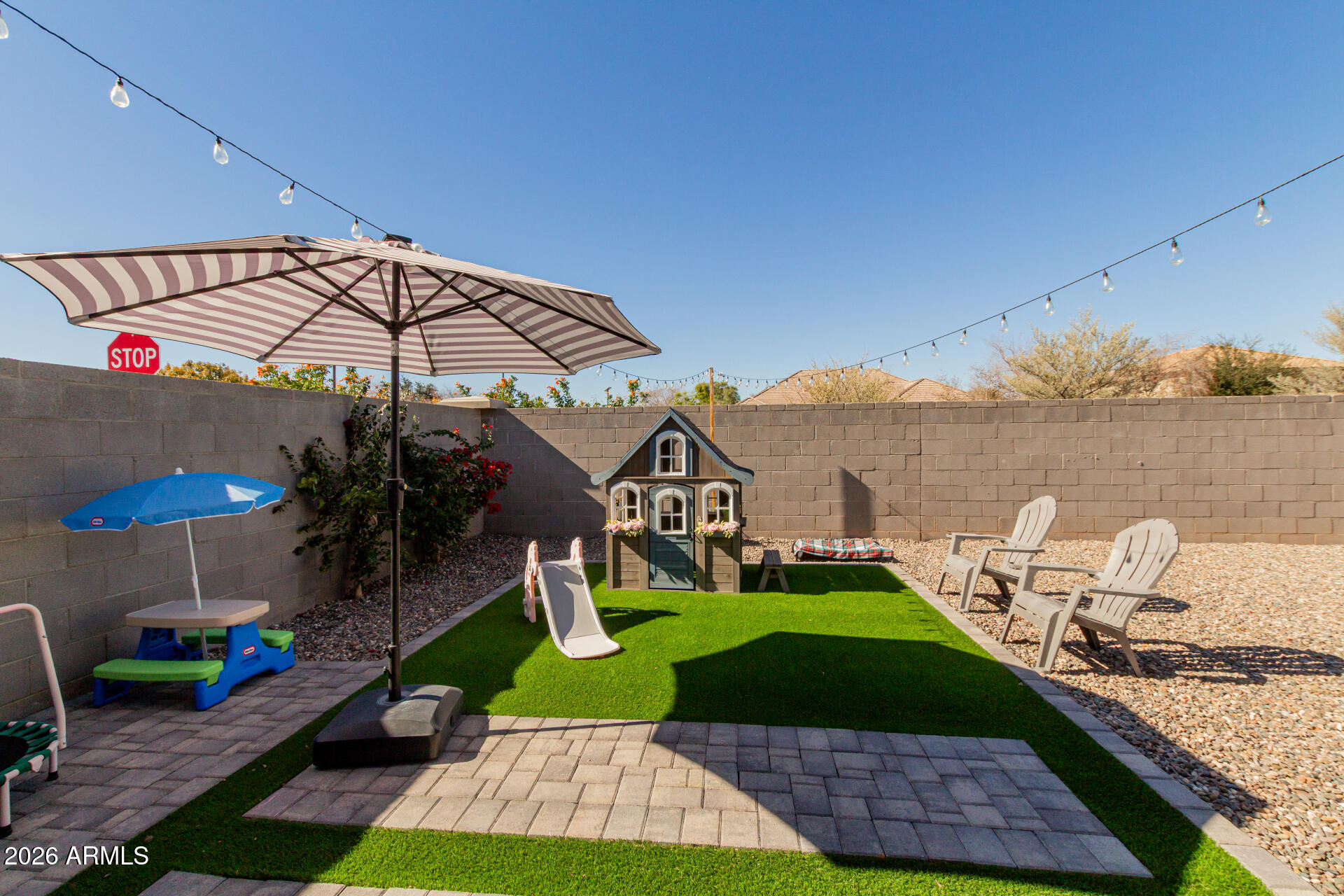 4702 South Riata Street Gilbert, AZ 85297 - Photo 30 of 31 a view of a swimming pool with a patio