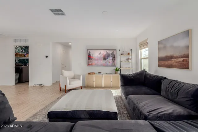 a living room with furniture and a couch