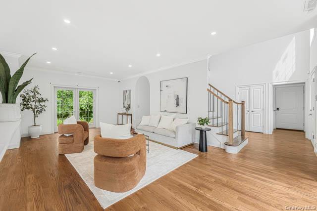 1 Kewanee Road New Rochelle, NY 10804 - Photo 19 of 36 a living room with furniture and a wooden floor