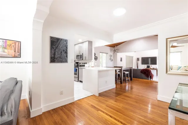 a view of a living room and dining room