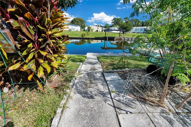 a view of yard with outdoor seating