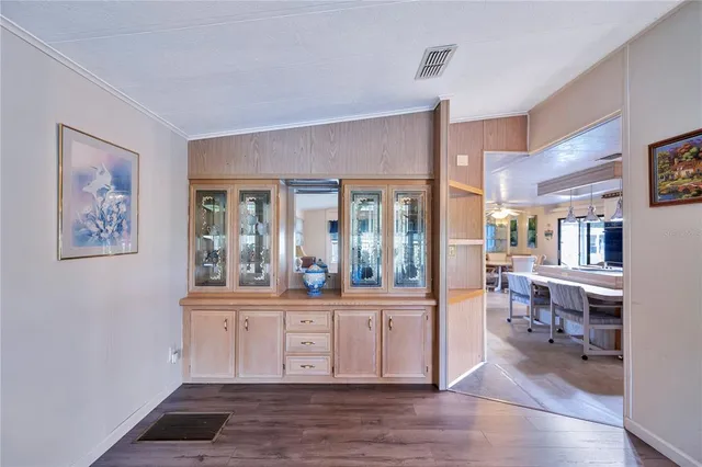 a view of a center kitchen and dining room