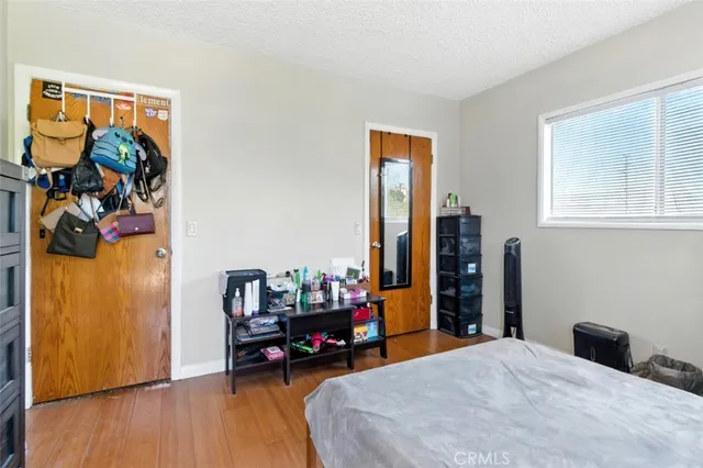 a view of a house with swimming pool and sitting area