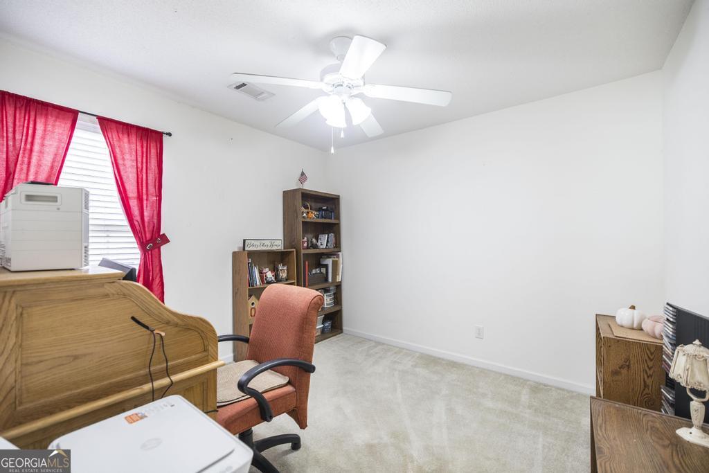 216 South Houston Springs Boulevard Perry, GA 31069 - Photo 20 of 31 a workspace with furniture and window