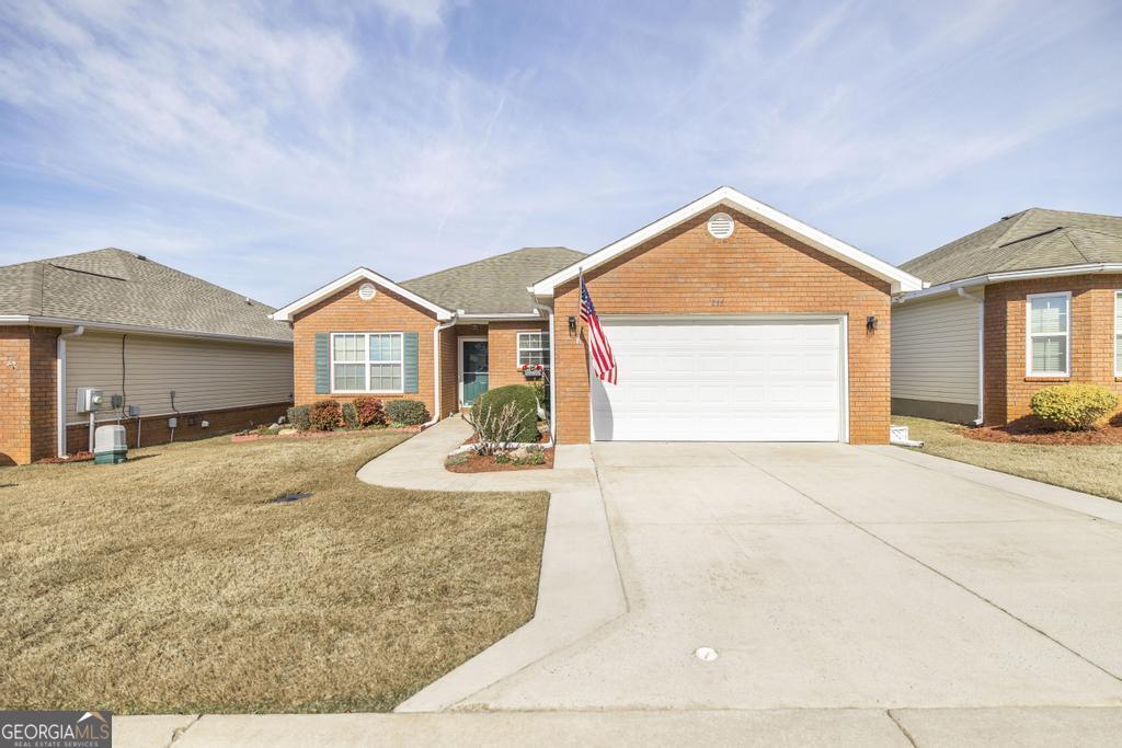 216 South Houston Springs Boulevard Perry, GA 31069 - Photo 2 of 31 a view of outdoor space yard and front view of a house