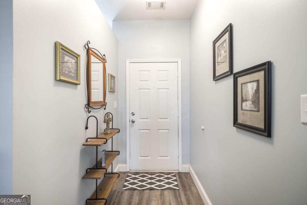 216 South Houston Springs Boulevard Perry, GA 31069 - Photo 7 of 31 a bathroom with a sink and a mirror