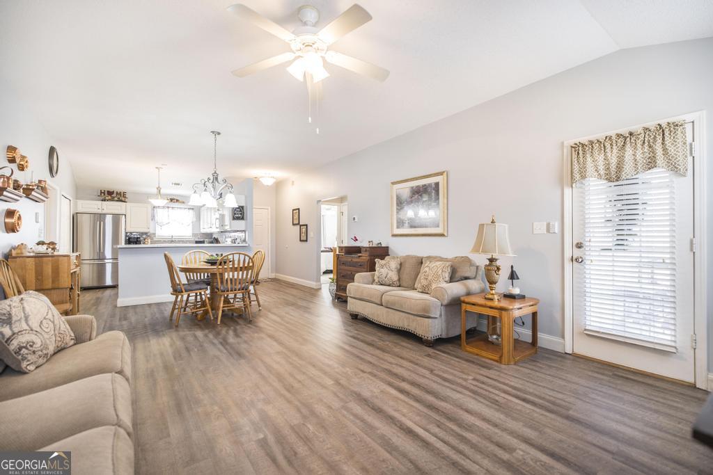 216 South Houston Springs Boulevard Perry, GA 31069 - Photo 10 of 31 a living room with furniture and a wooden floor