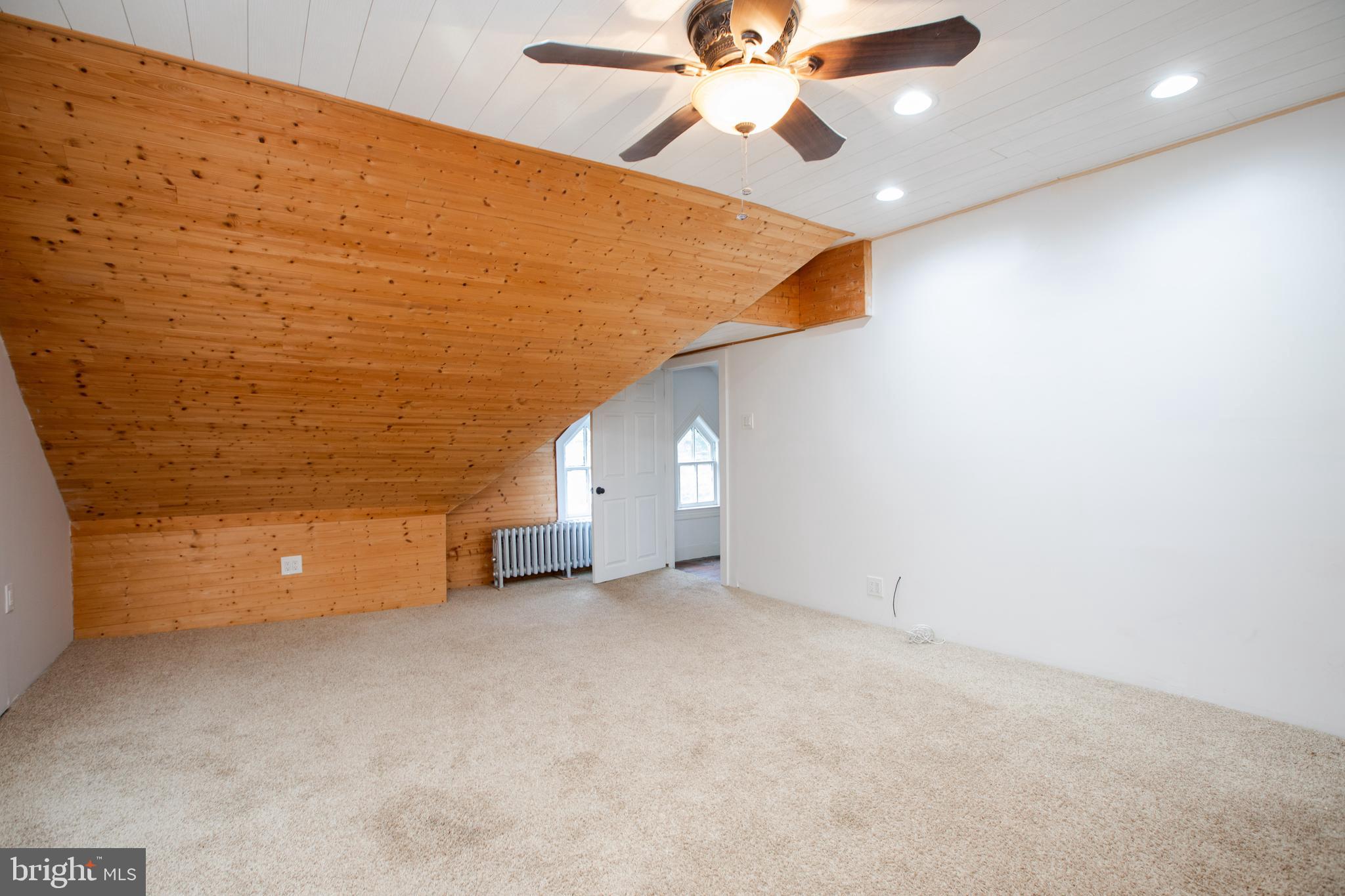 239 Main Street Hamilton, NJ 08620 - Photo 29 of 39 a view of a big room with ceiling fan and closet