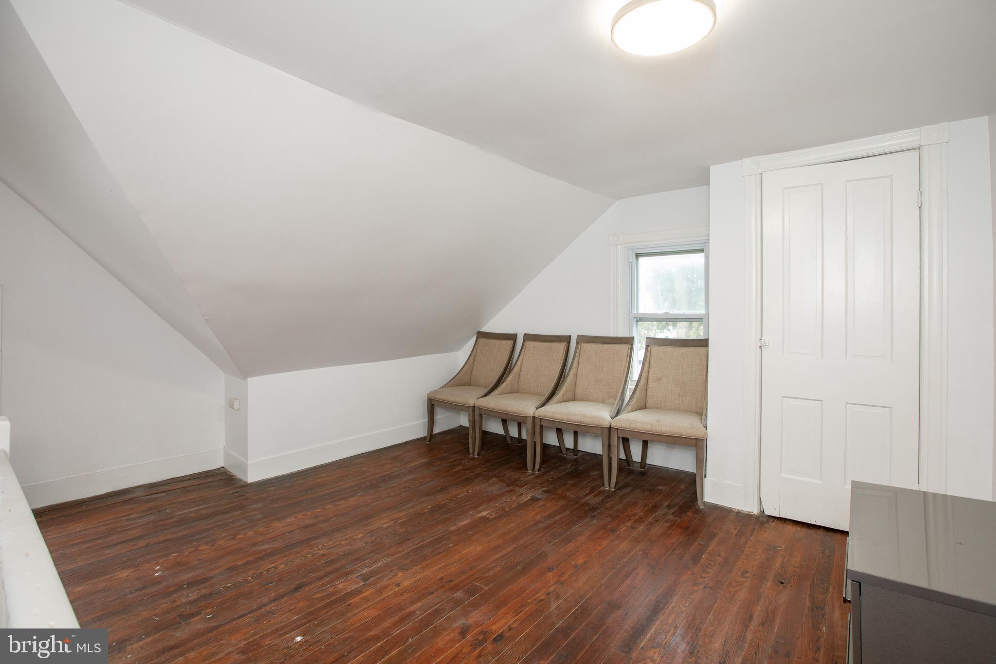 239 Main Street Hamilton, NJ 08620 - Photo 32 of 39 an empty room with wooden floor and furniture