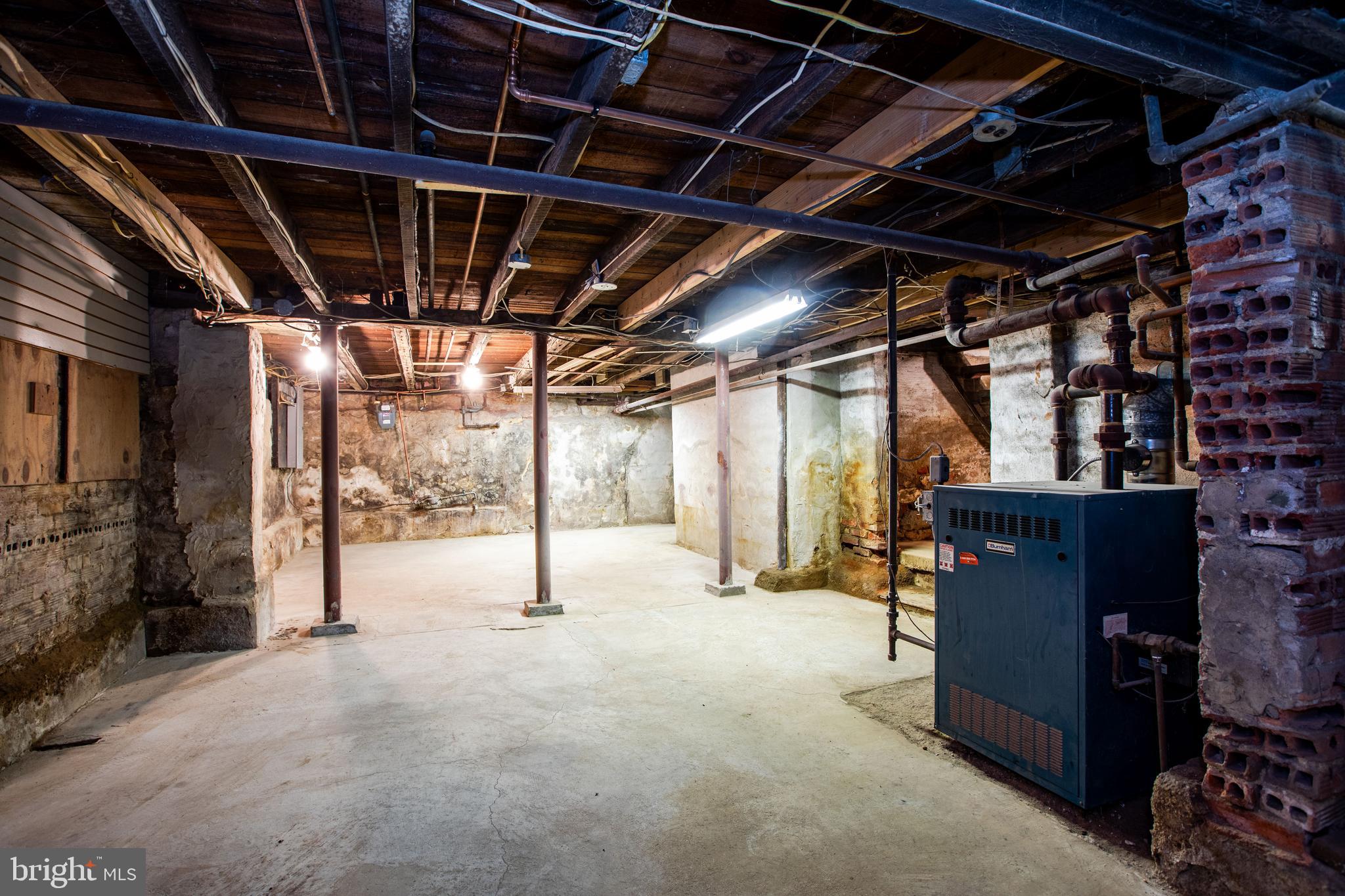 239 Main Street Hamilton, NJ 08620 - Photo 36 of 39 a view of an empty room with wooden walls