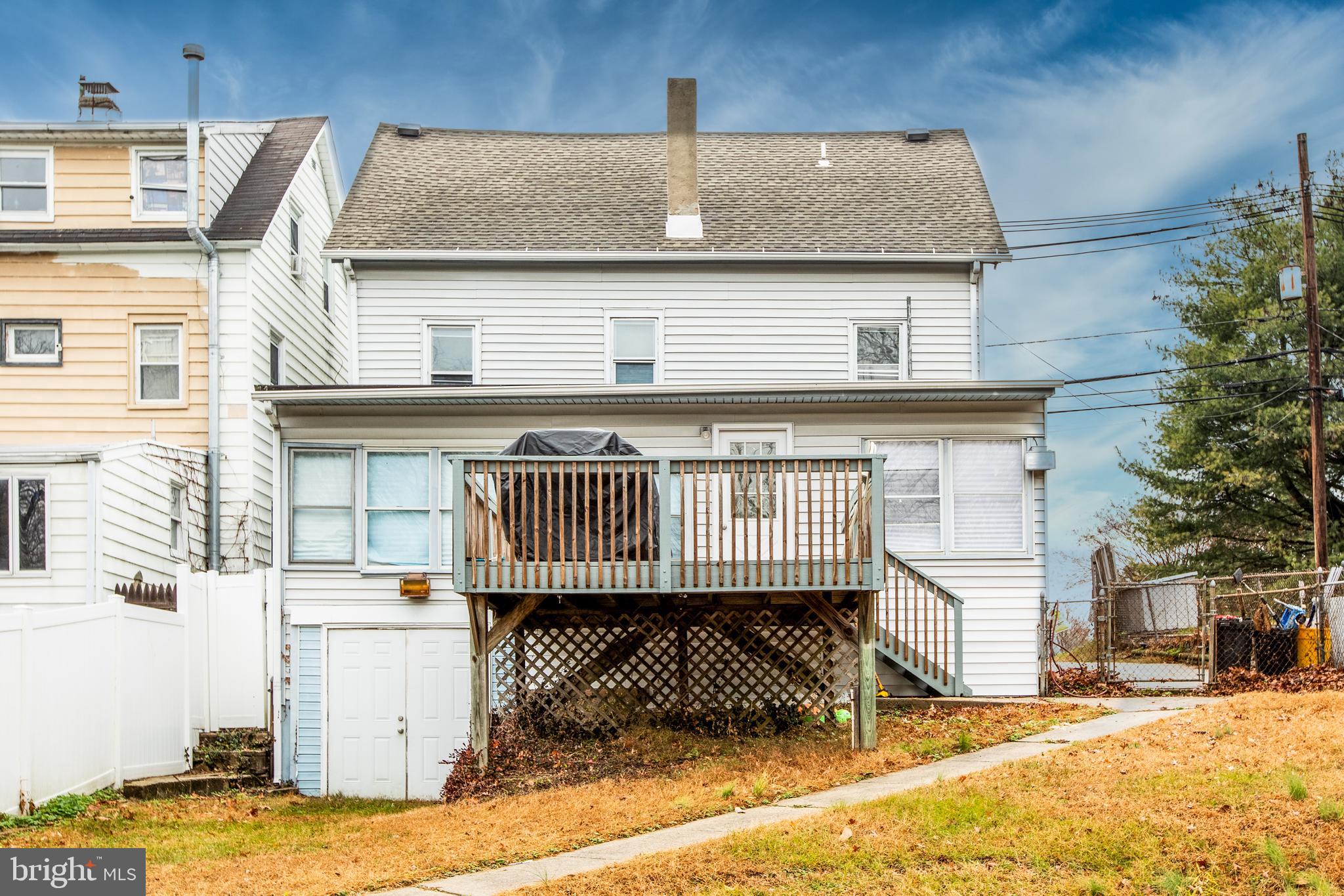 239 Main Street Hamilton, NJ 08620 - Photo 39 of 39 a front view of a house with a yard