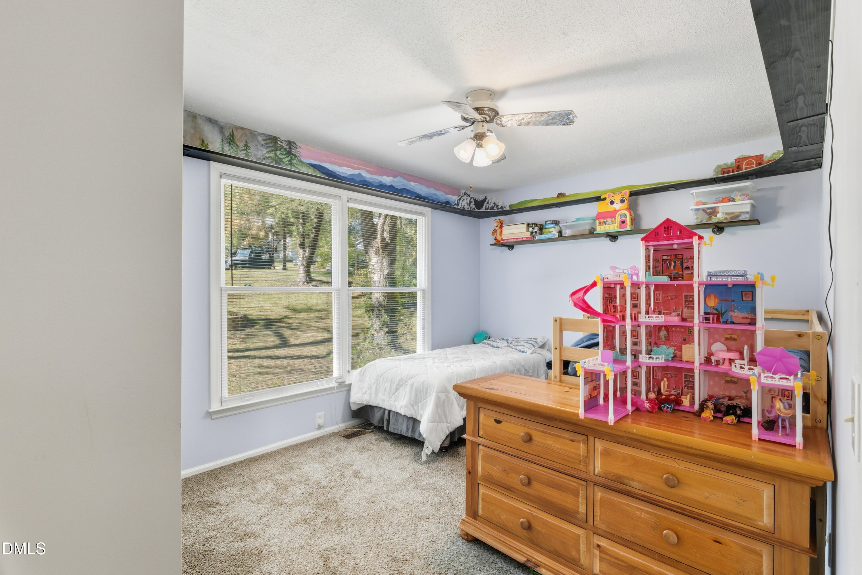 6125 Bellow Street Raleigh, NC 27609 - Photo 19 of 41 a bed room with a bed and a window