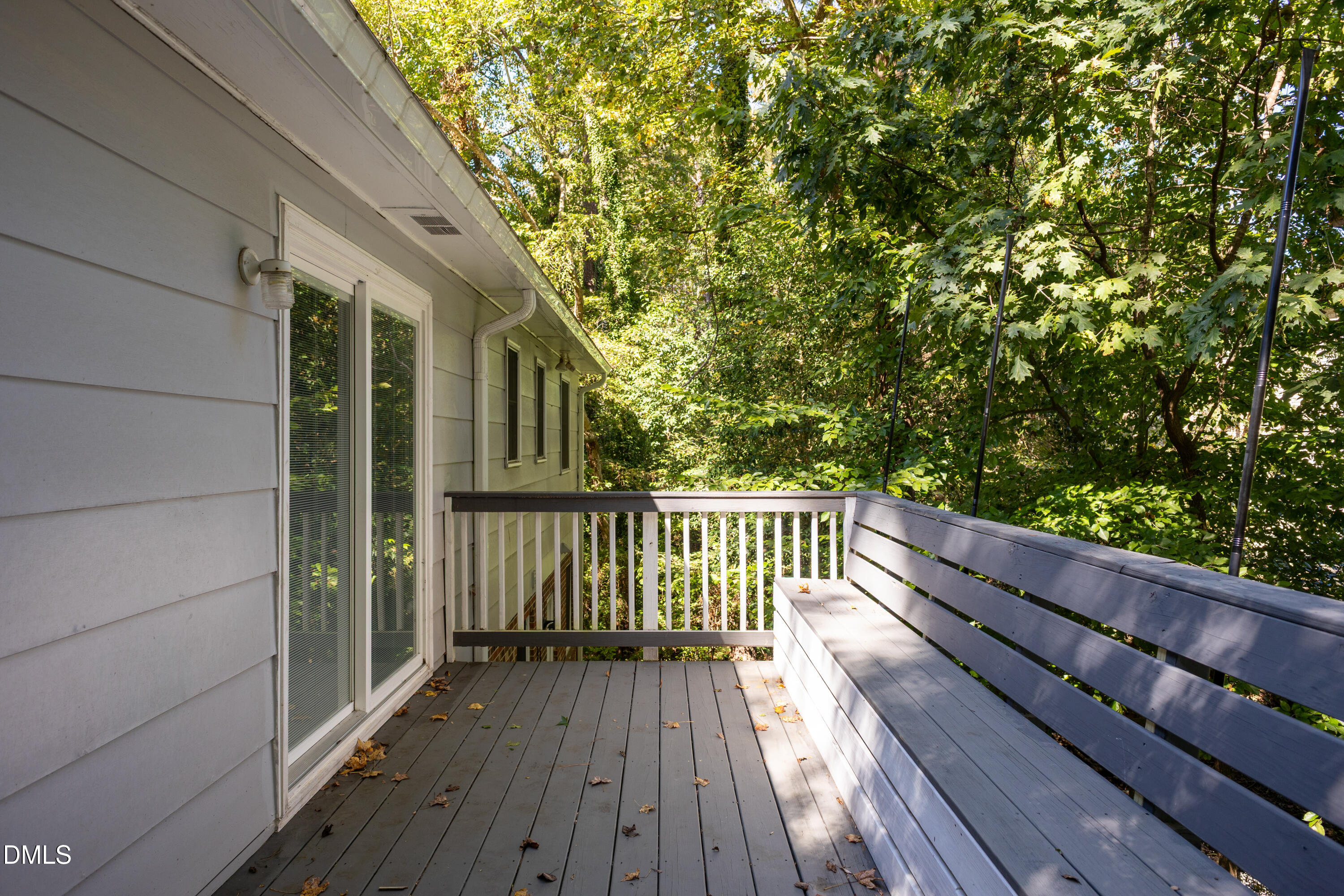 6125 Bellow Street Raleigh, NC 27609 - Photo 35 of 41 a view of balcony with wooden floor