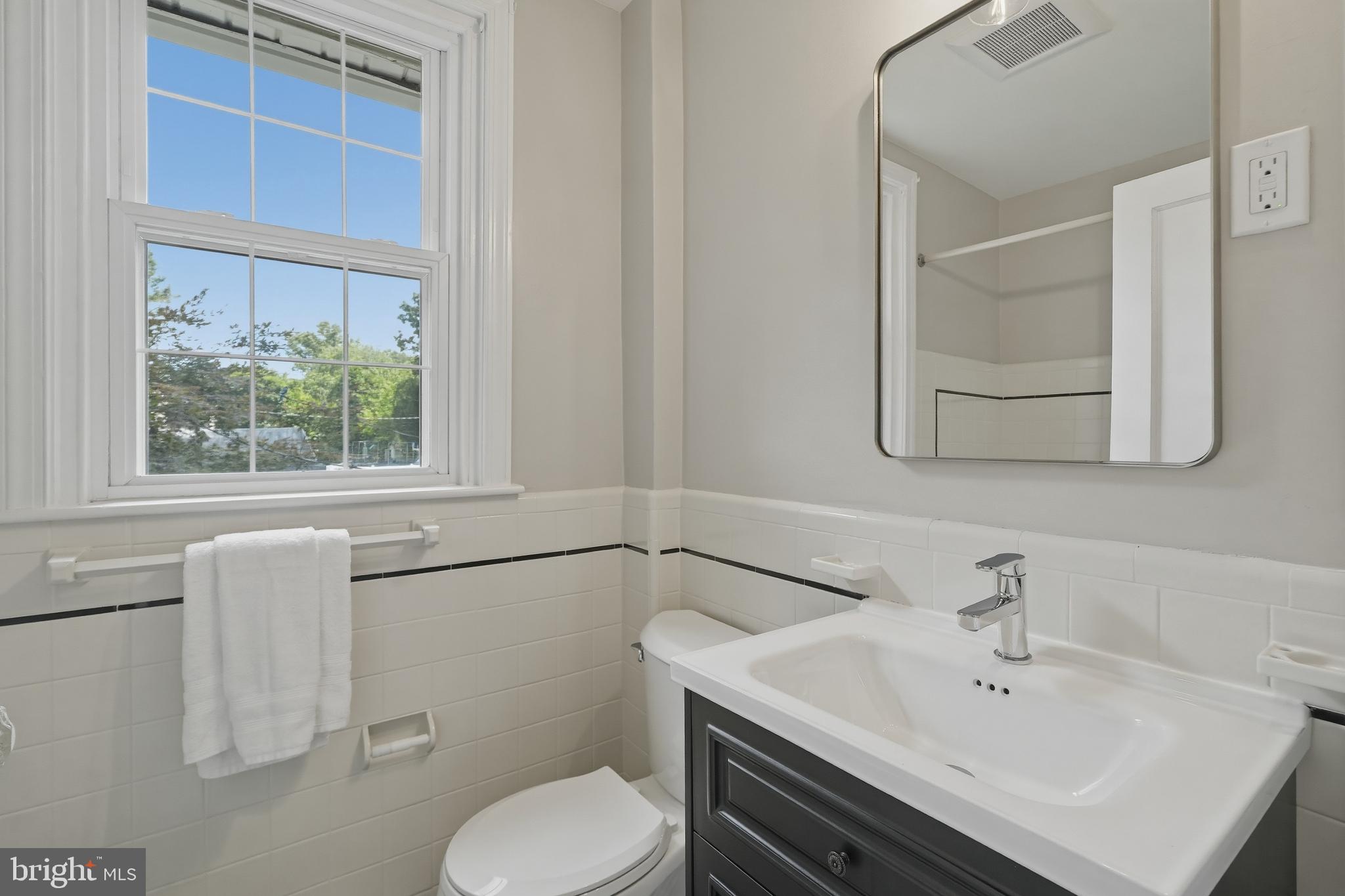 800 Pleasant Hill Road Wallingford, PA 19086 - Photo 30 of 34 a bathroom with a sink toilet and vanity