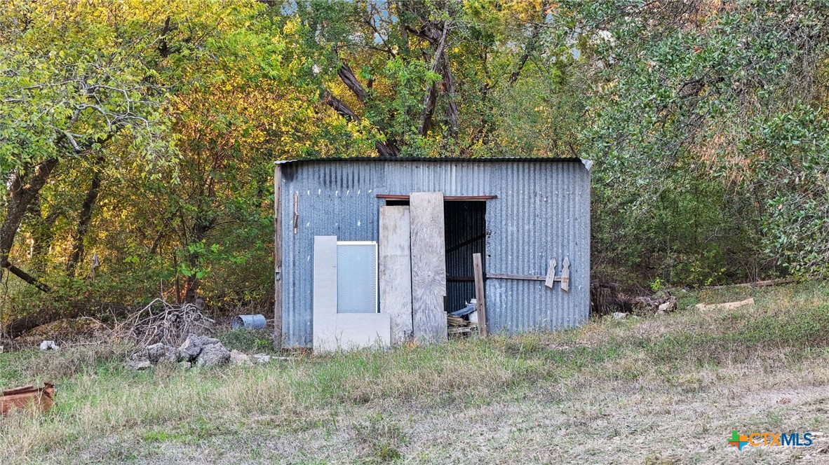 24007 Windy Valley Road Leander, TX 78641 - Photo 16 of 24 a view of a wooden fence
