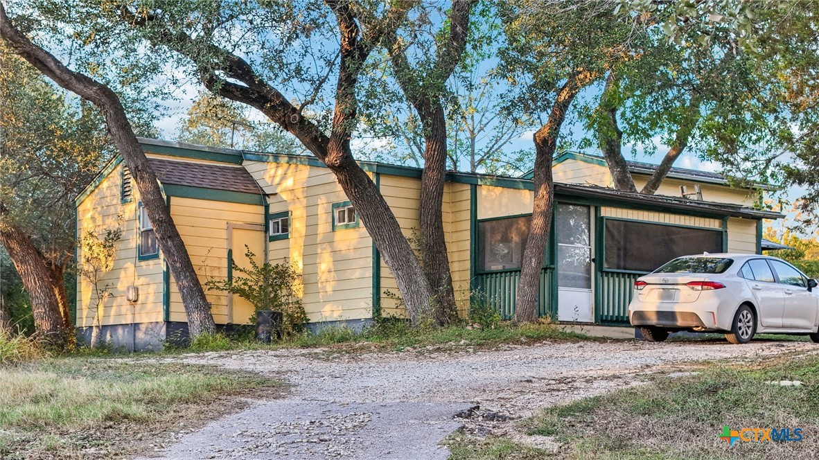 24007 Windy Valley Road Leander, TX 78641 - Photo 2 of 24 a car parked in front of a house